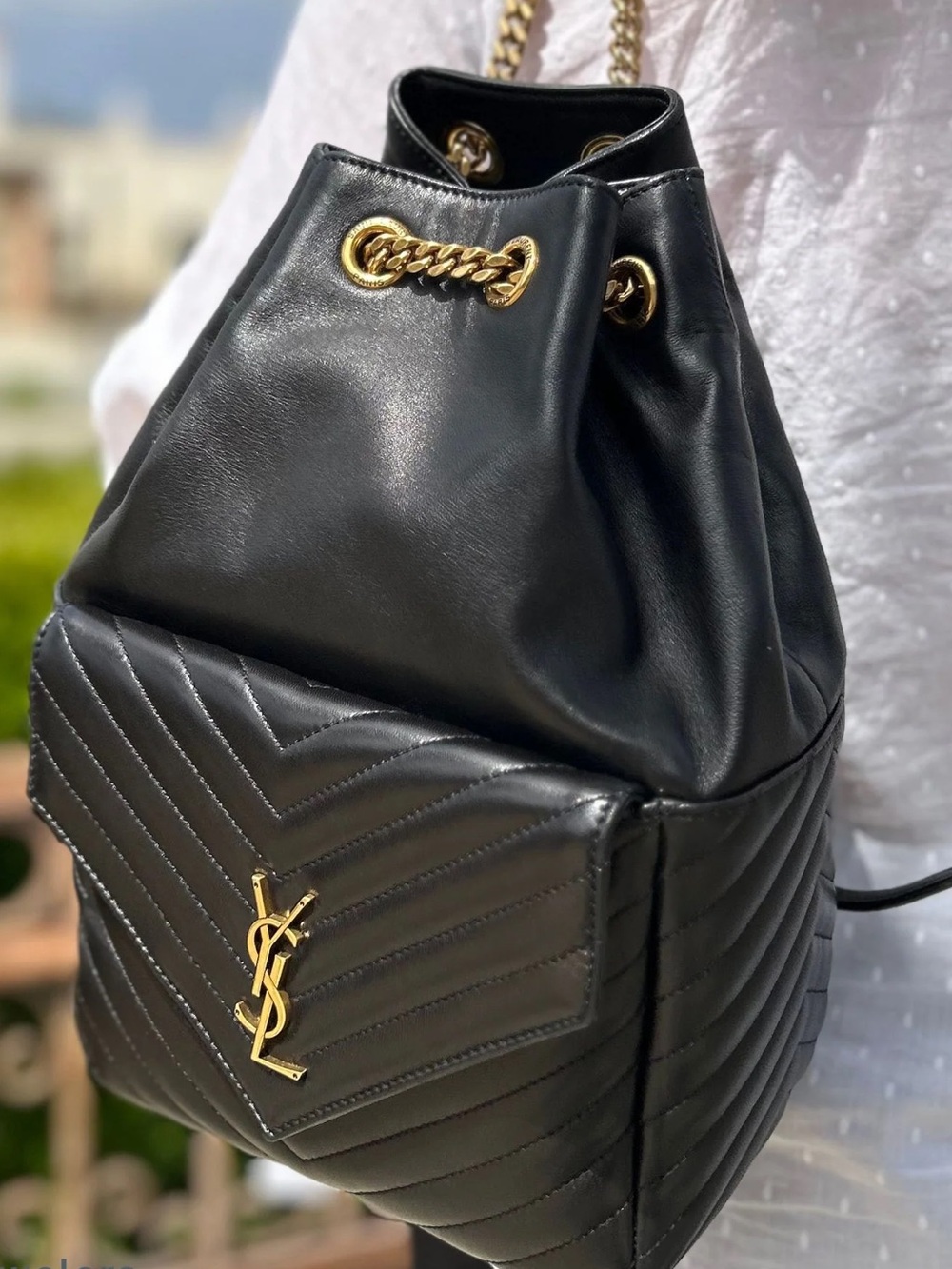 YVES SAINT LAURENT BLACK LAMBSKIN MATELASSE MONOGRAM JOE DRAWSTRING BACKPACK